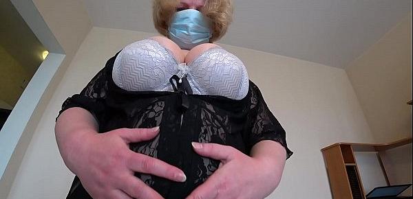  Busty milf in stockings doggystyle masturbates with a rubber dick and shakes a big butt in panties.